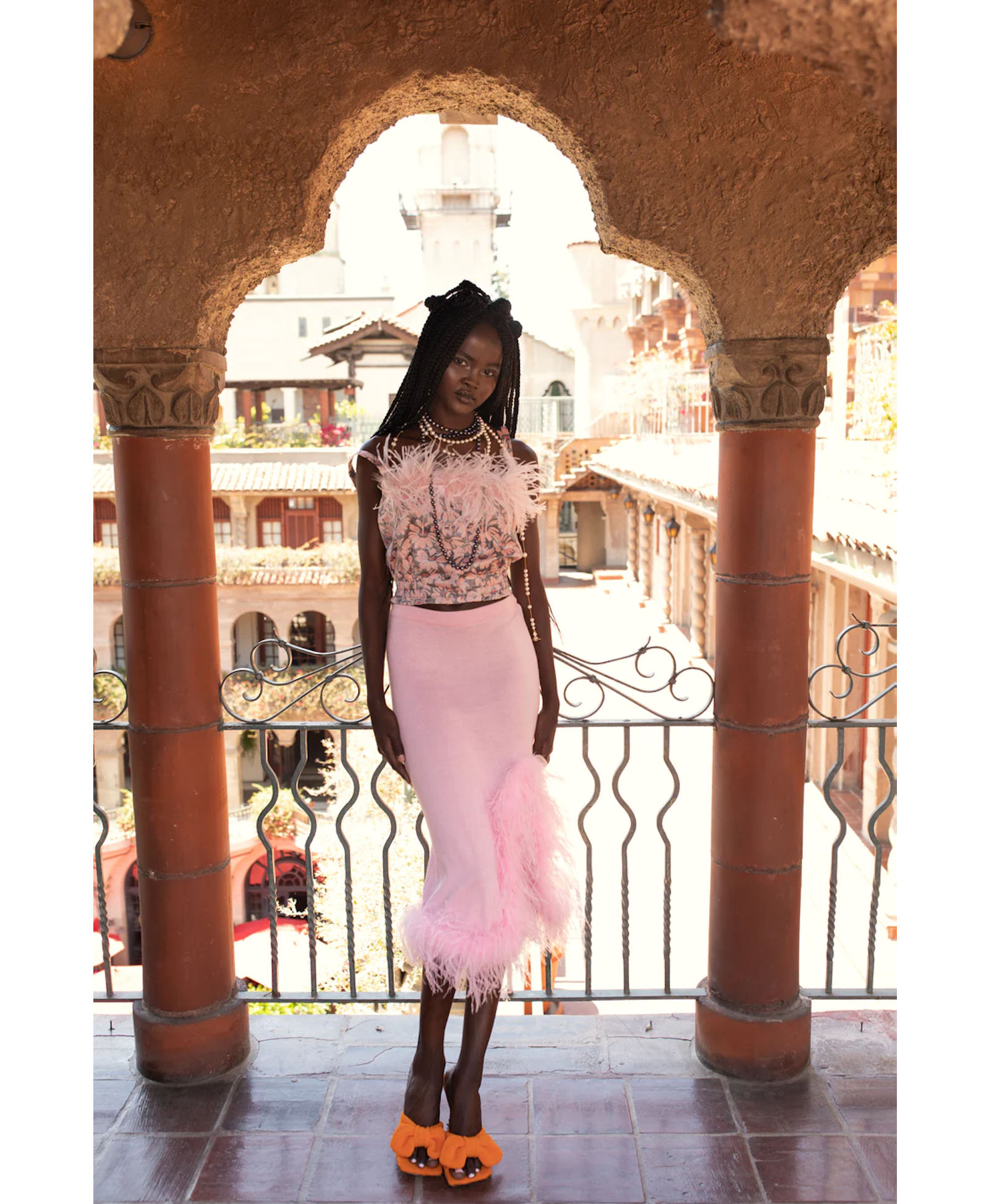 Grey flower top with pink feather details and pearl buttons made by ANDREEVA