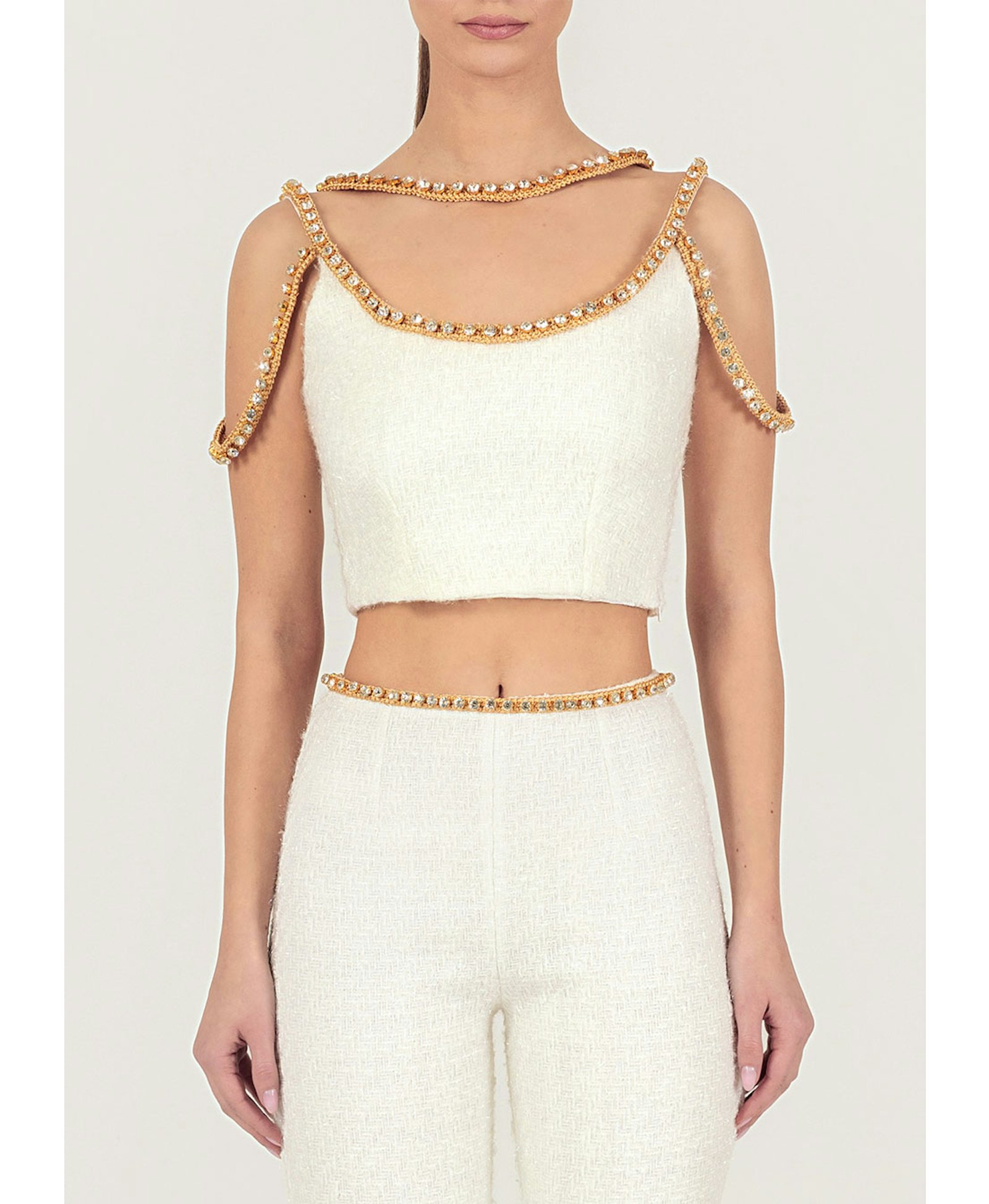 Gold thread-embroidered tweed pants made by Monika Dimova