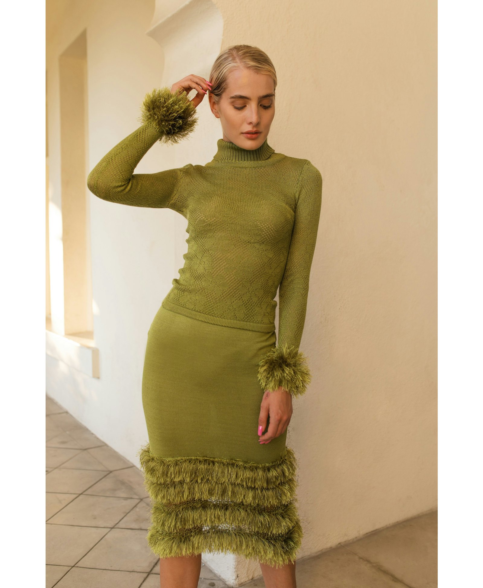 Green knit turtleneck with handmade knit details made by ANDREEVA