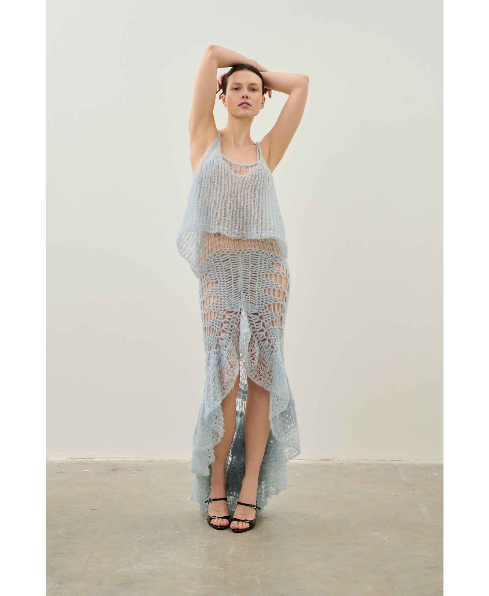 Handmade crochet dress in a shade of blue made by Karen Arcanjo