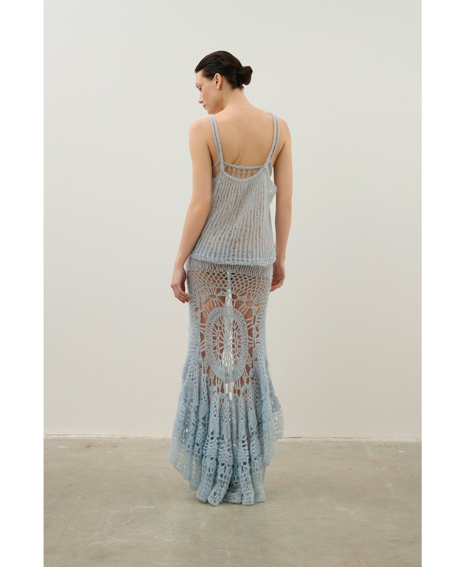 Handmade crochet dress in a shade of blue made by Karen Arcanjo