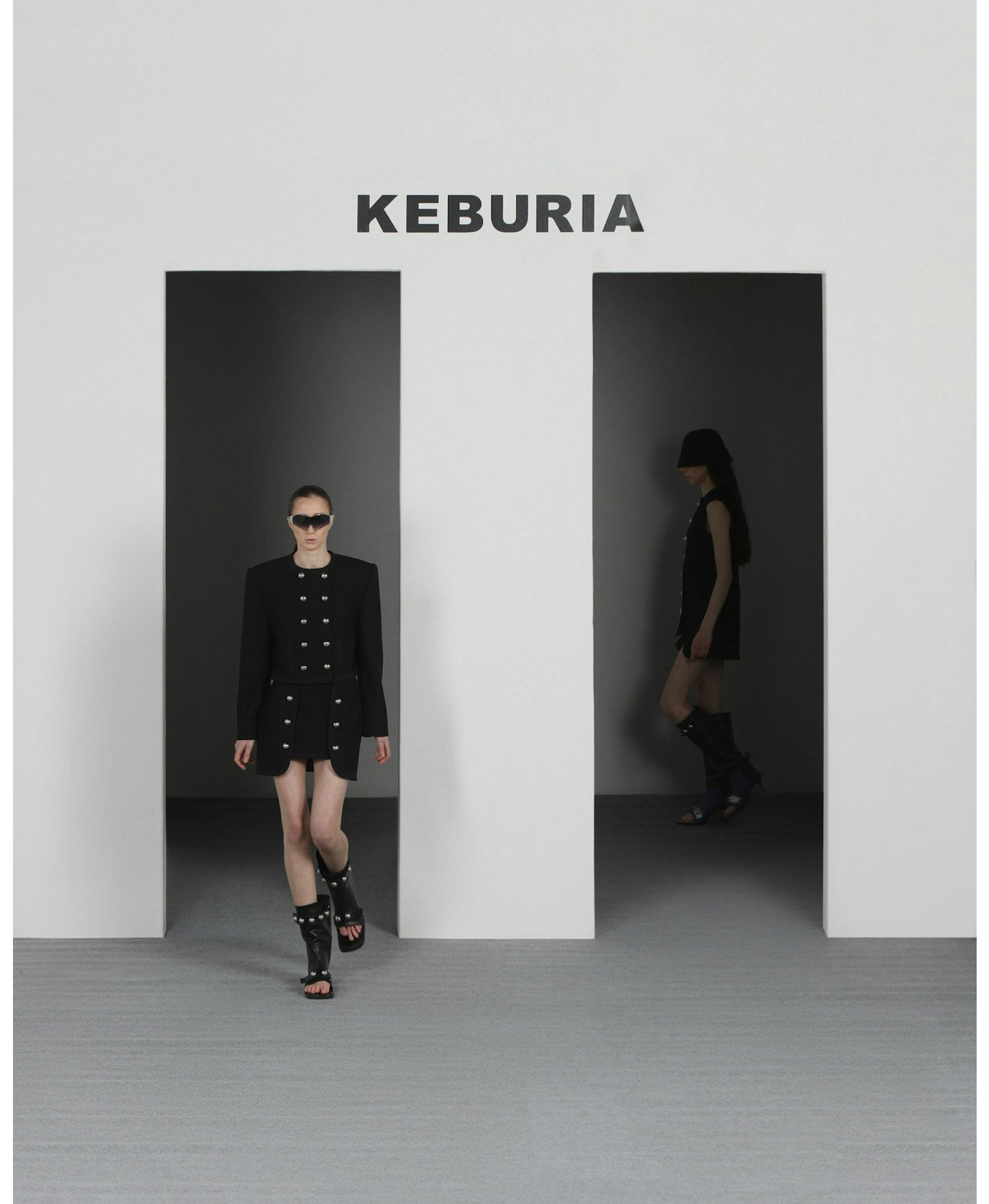 WOOL ASYMMETRIC MINI SKIRT in Black made by KEBURIA