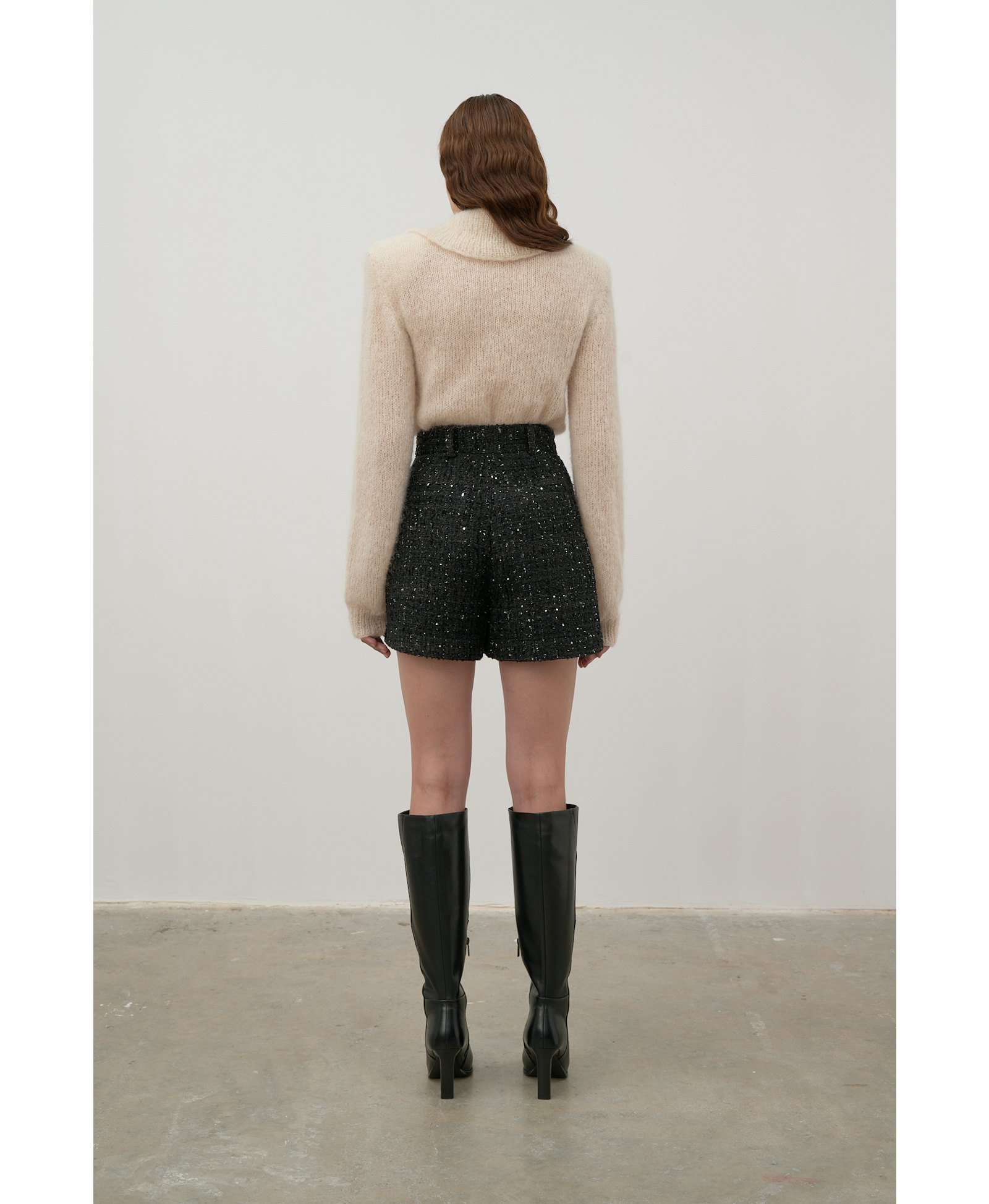 Hand-knitted sweater made by Karen Arcanjo