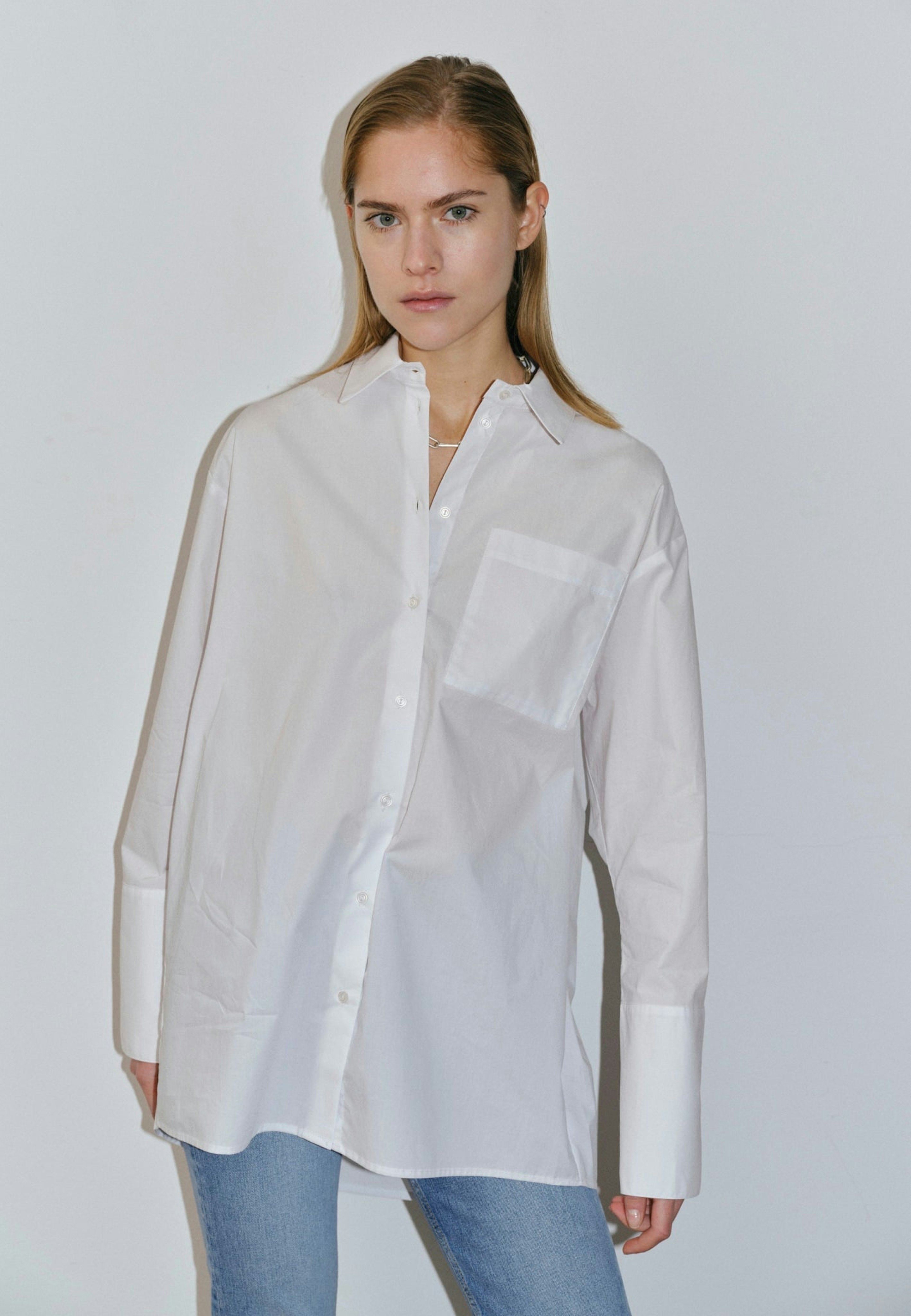 Shop Henrich Shirt - White from HERSKIND at Seezona