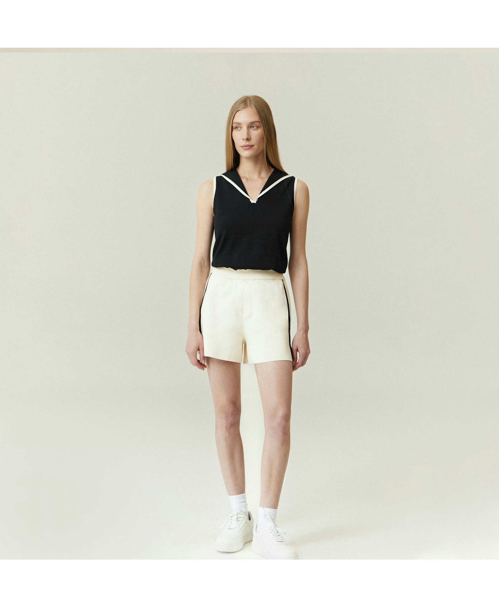 COLORBLOCKED LAPEL KNITTED VEST in Black made by CRUSH Collection