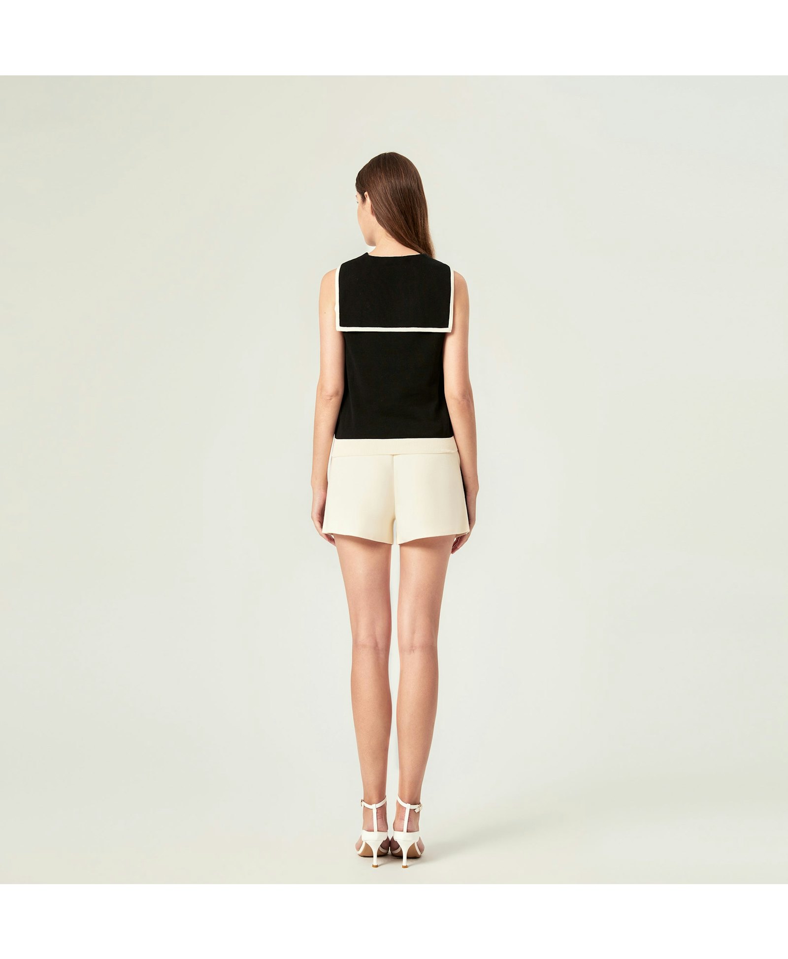 COLORBLOCKED LAPEL KNITTED VEST in Black made by CRUSH Collection