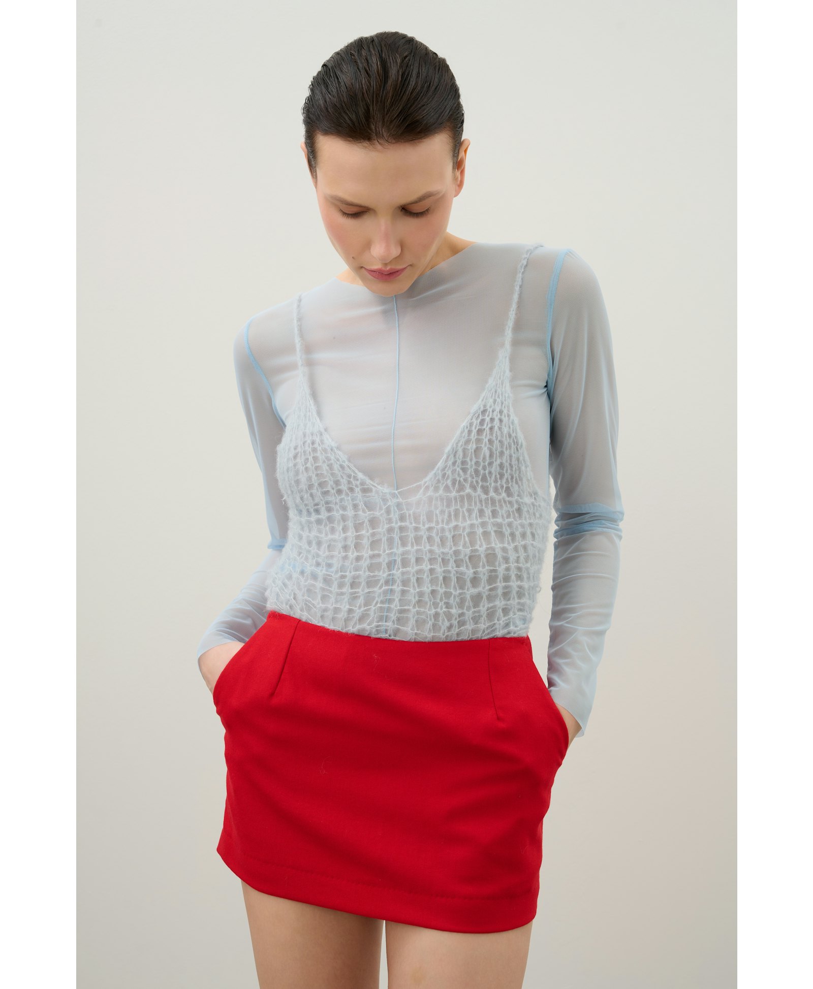 Skirt and shorts made of red wool made by Karen Arcanjo