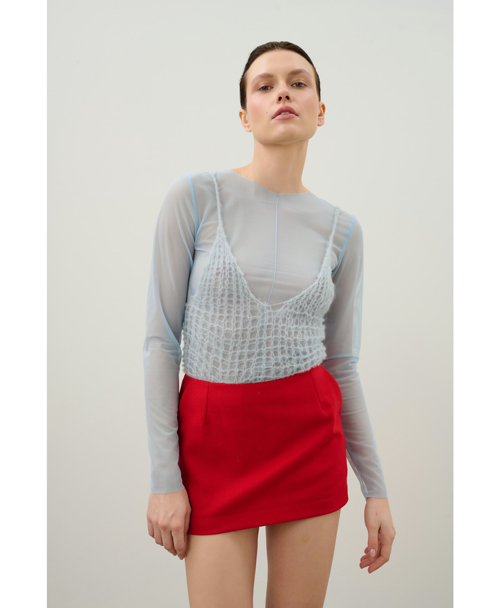 Skirt and shorts made of red wool made by Karen Arcanjo