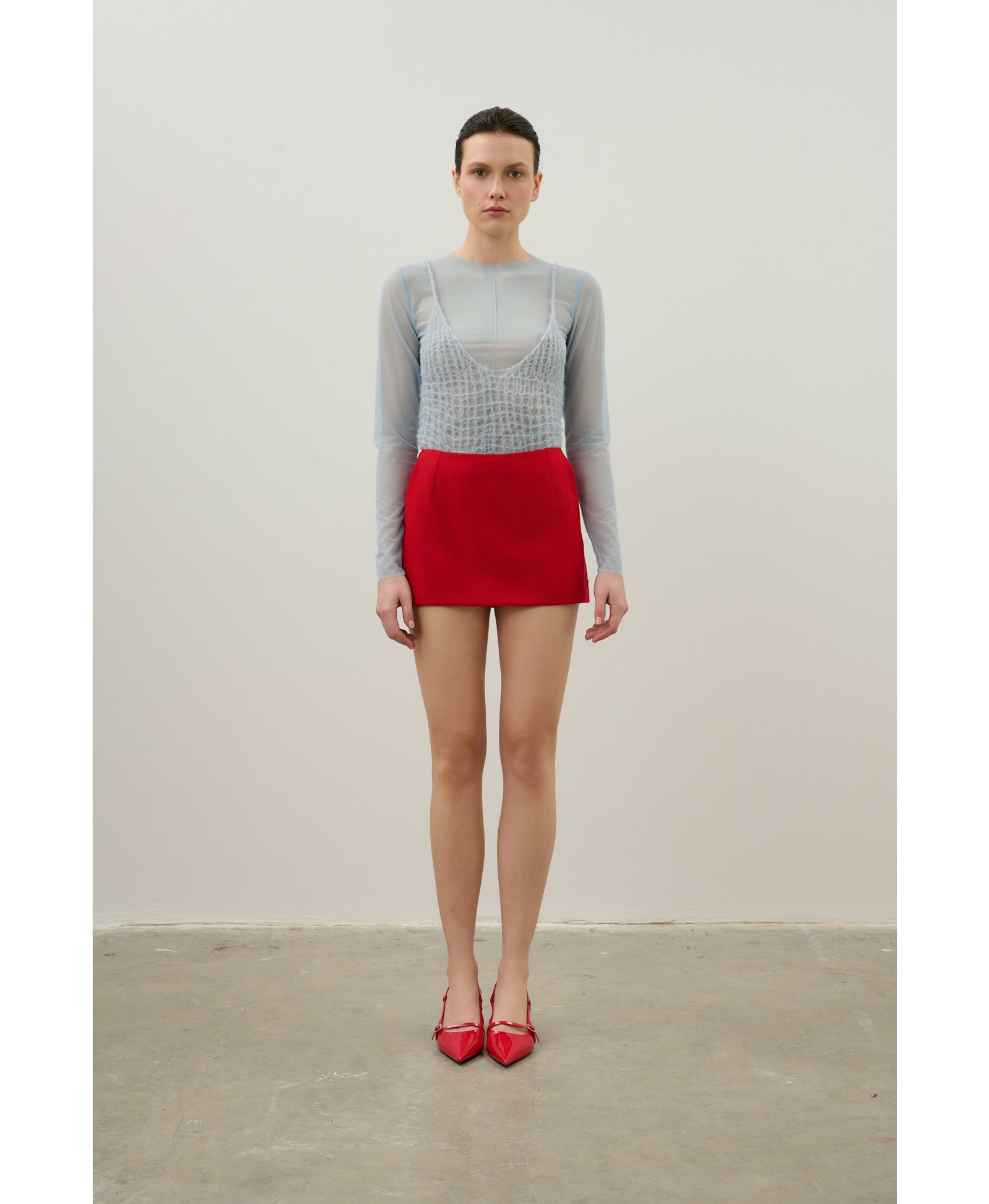 Skirt and shorts made of red wool made by Karen Arcanjo