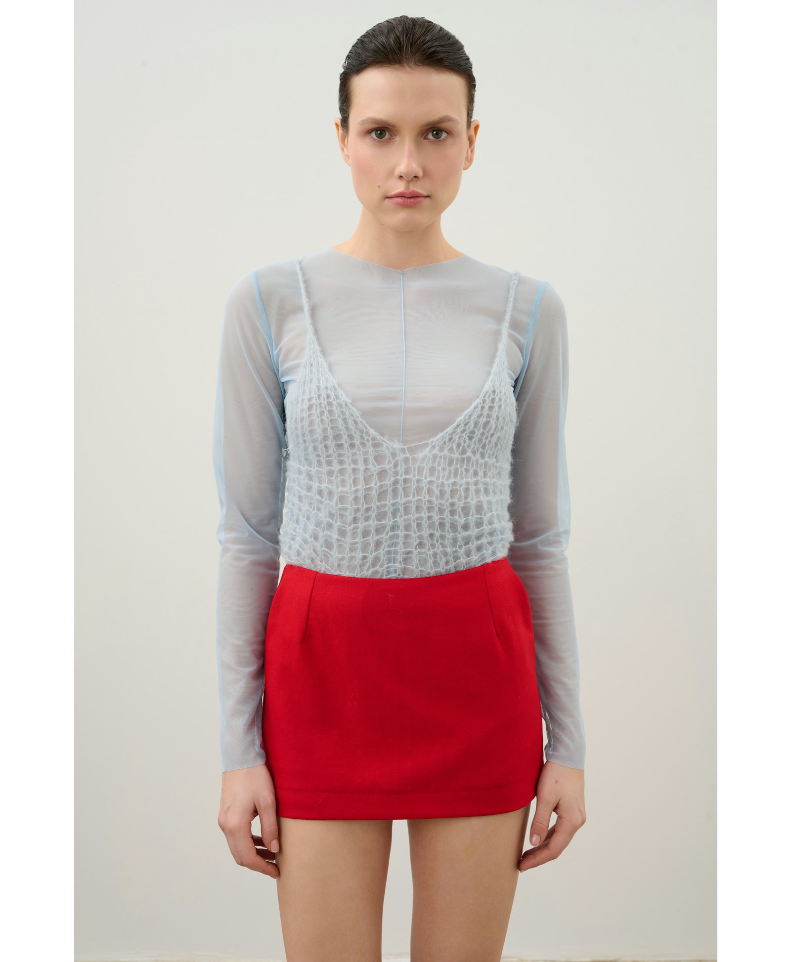 Skirt and shorts made of red wool made by Karen Arcanjo