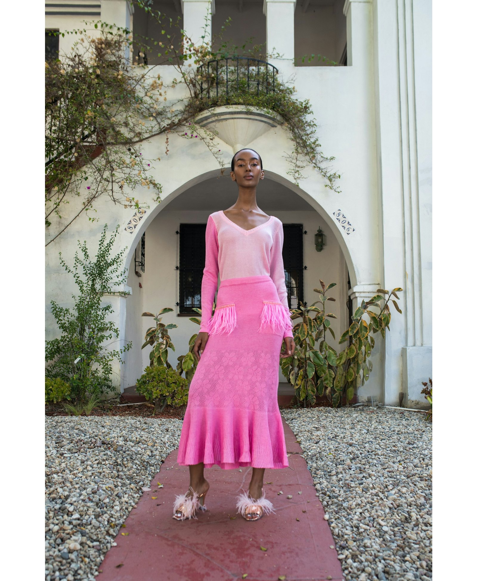 Pink Knit Skirt With Feather Details On the Pocket by made by ANDREEVA