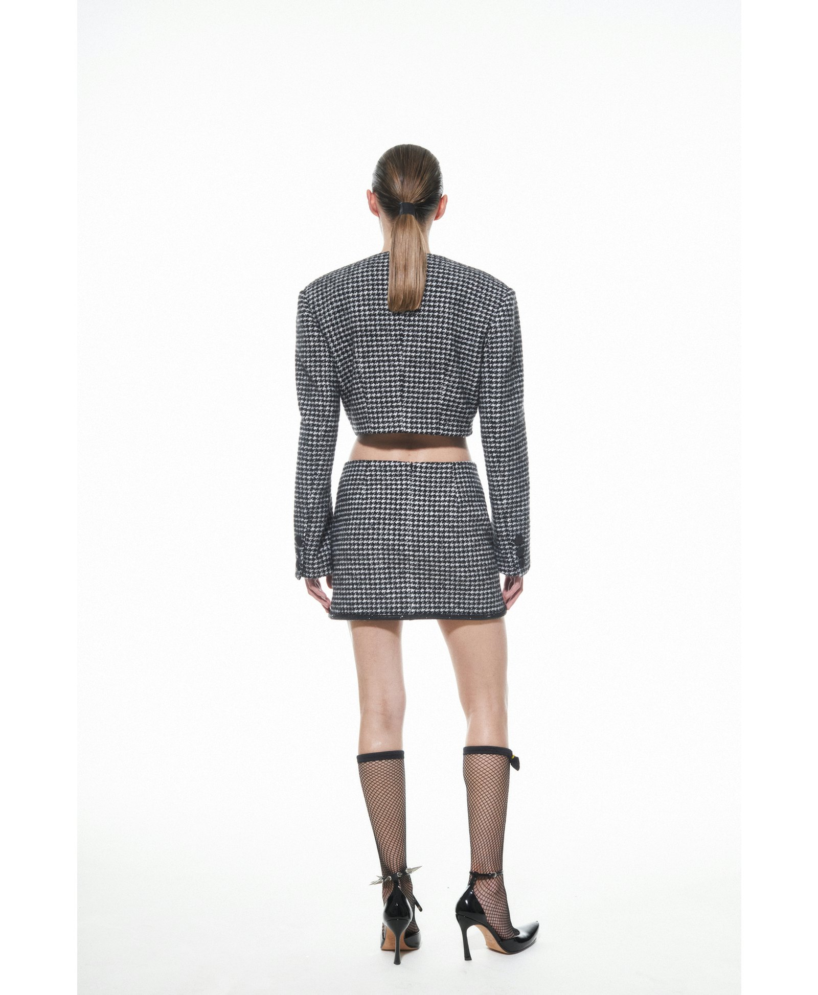 HOUNDSTOOTH SKIRT MINI in Black made by NUÉ