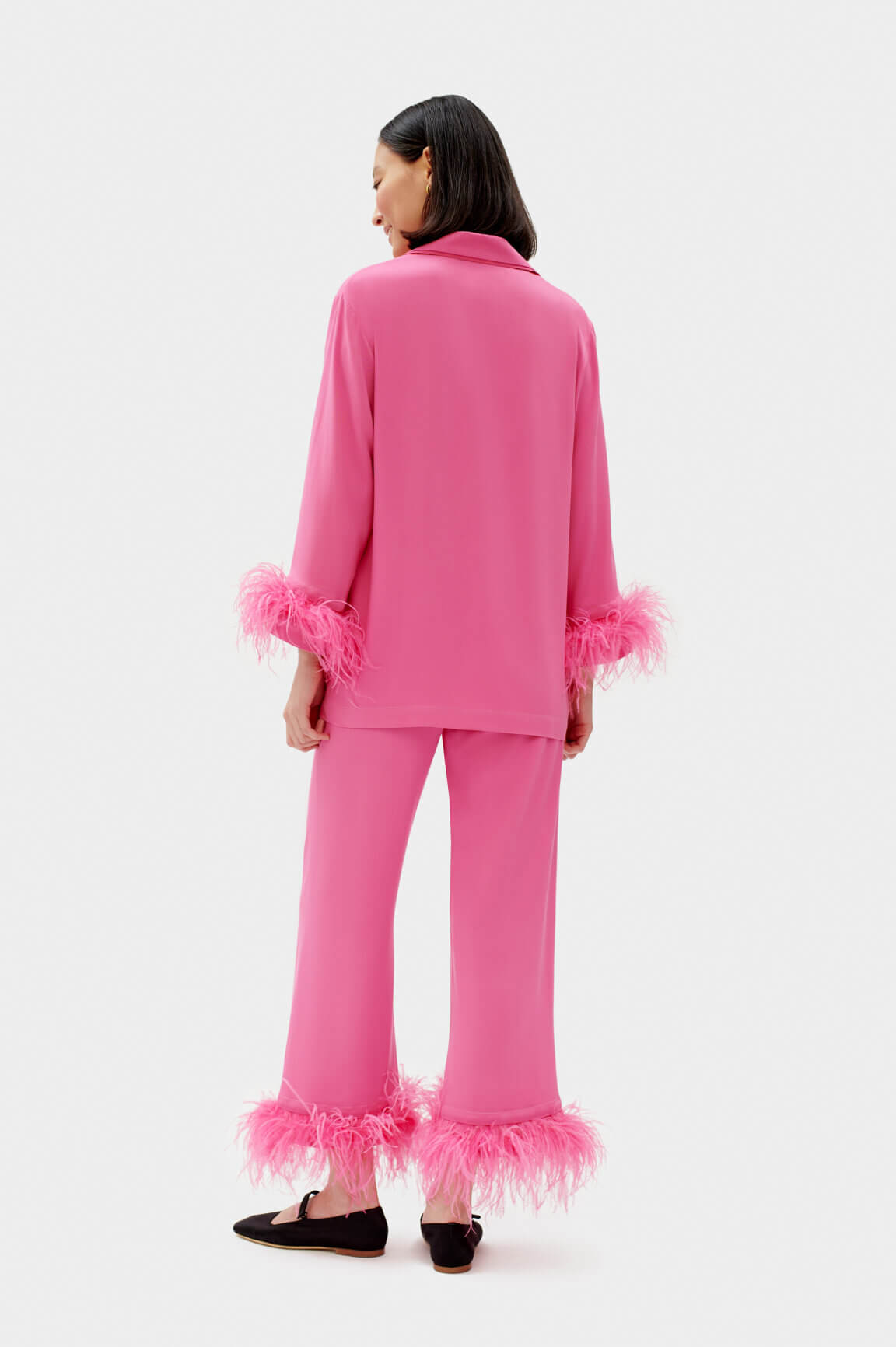 Shop pajamas set with feathers in hot pink from Sleeper at Seezona