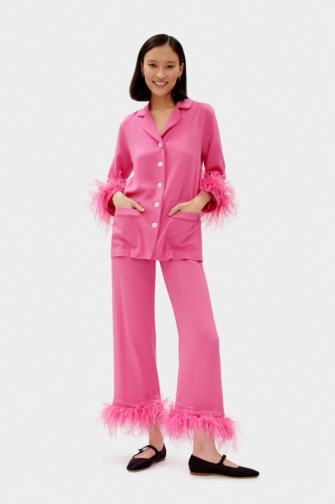 Shop pajamas set with feathers in hot pink from Sleeper at Seezona