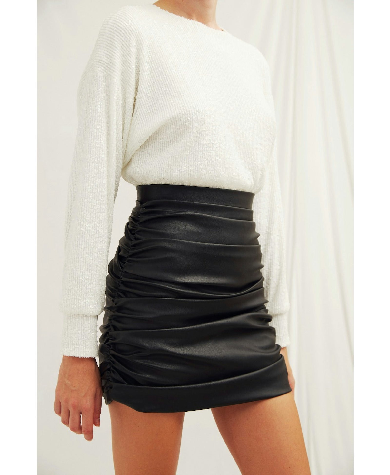 Chels Ruched Vegan Leather Mini Skirt in Black made by Nazli Ceren