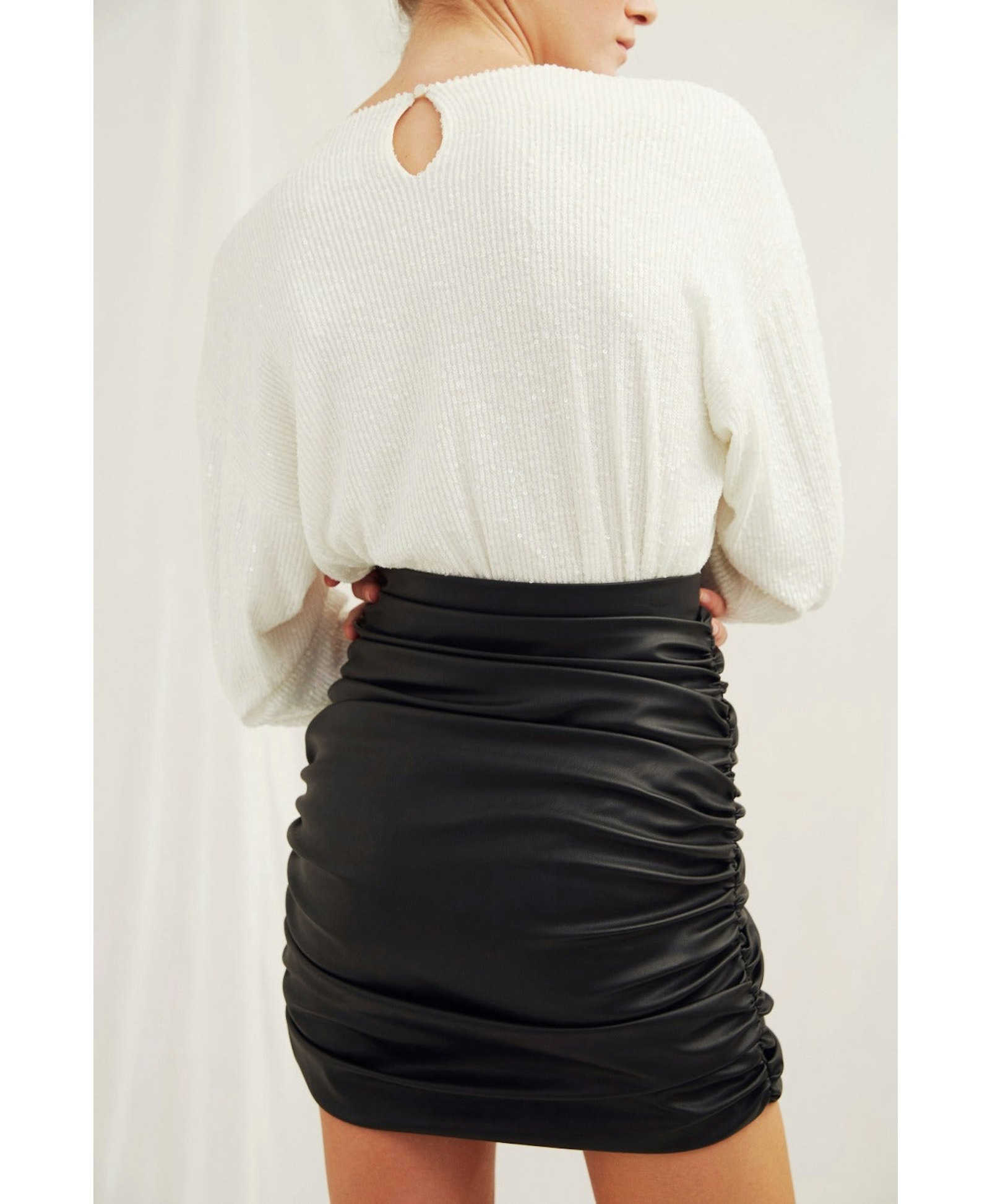 Chels Ruched Vegan Leather Mini Skirt in Black made by Nazli Ceren