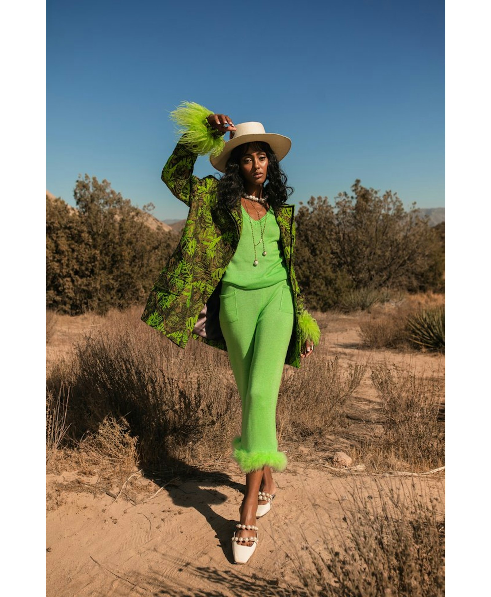 Mint knit pants with feather details made by ANDREEVA