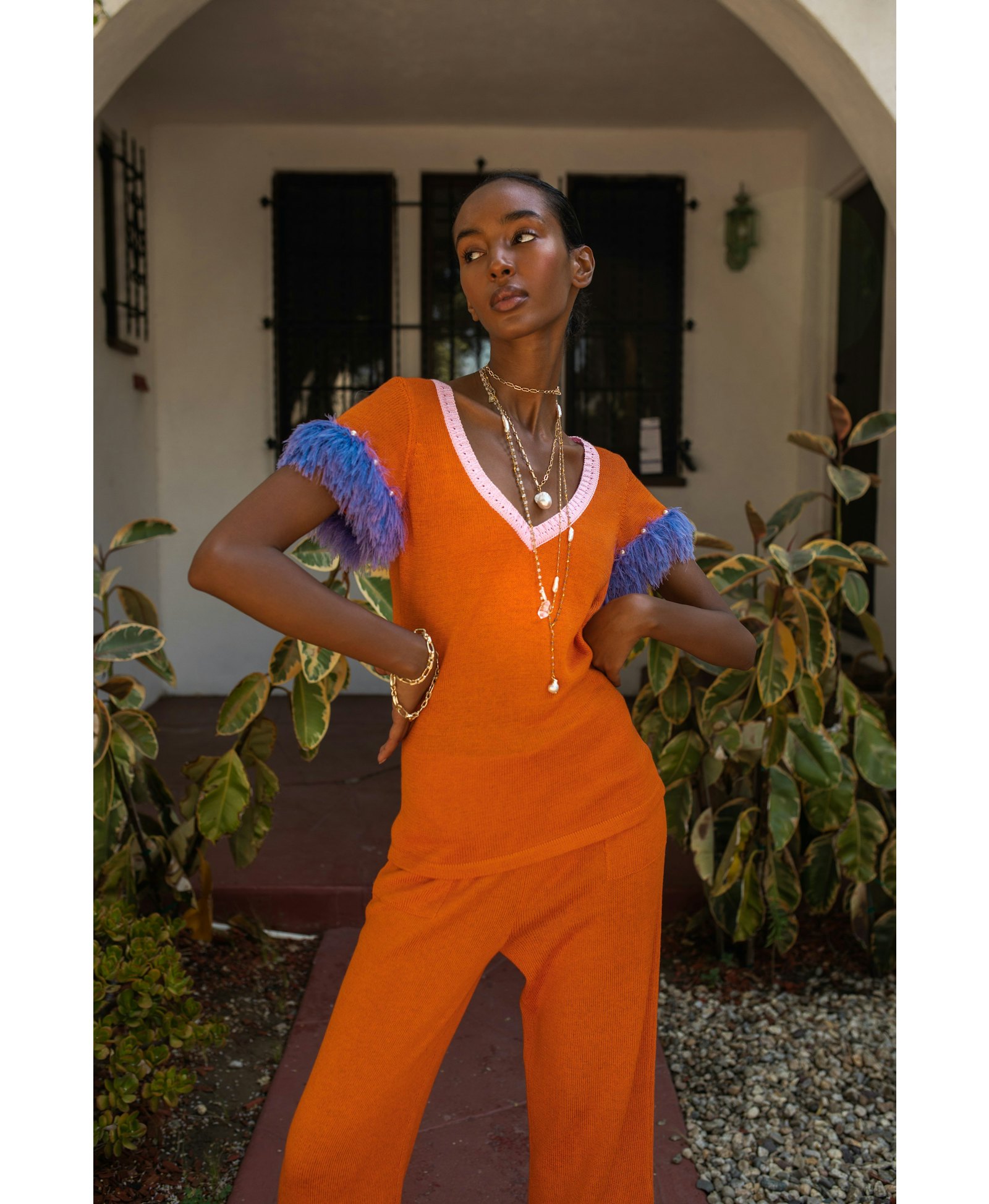Golden poppy knit top with handmade knit details and pearls made by ANDREEVA