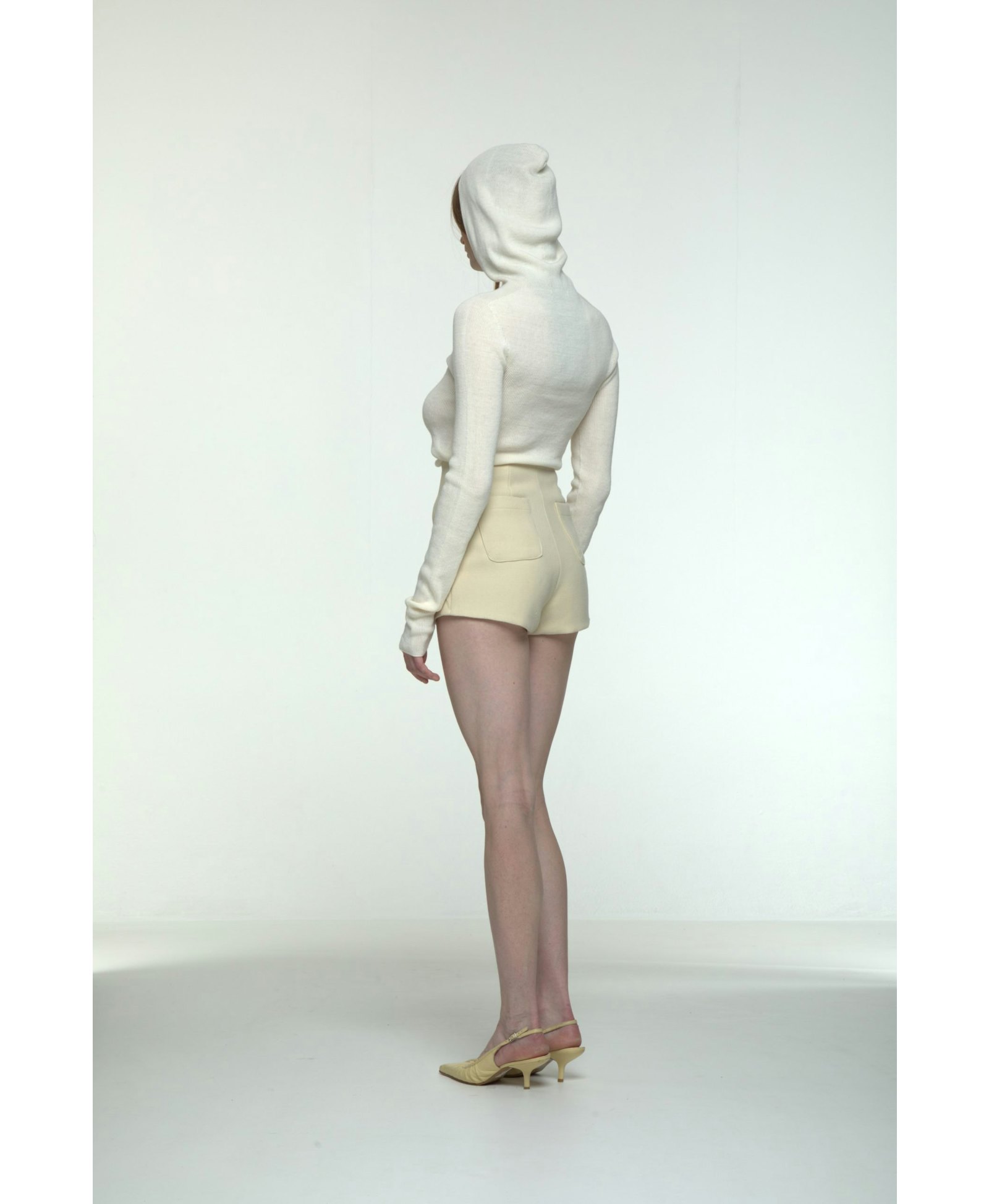 Hooded ribbed top in White made by AFTERHOURS