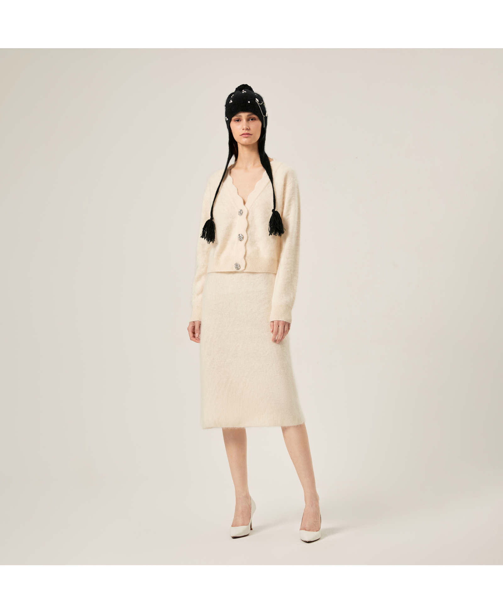 FLUFFY CASHMERE SCALLOPED V-NECK CARDIGAN in White made by CRUSH Collection