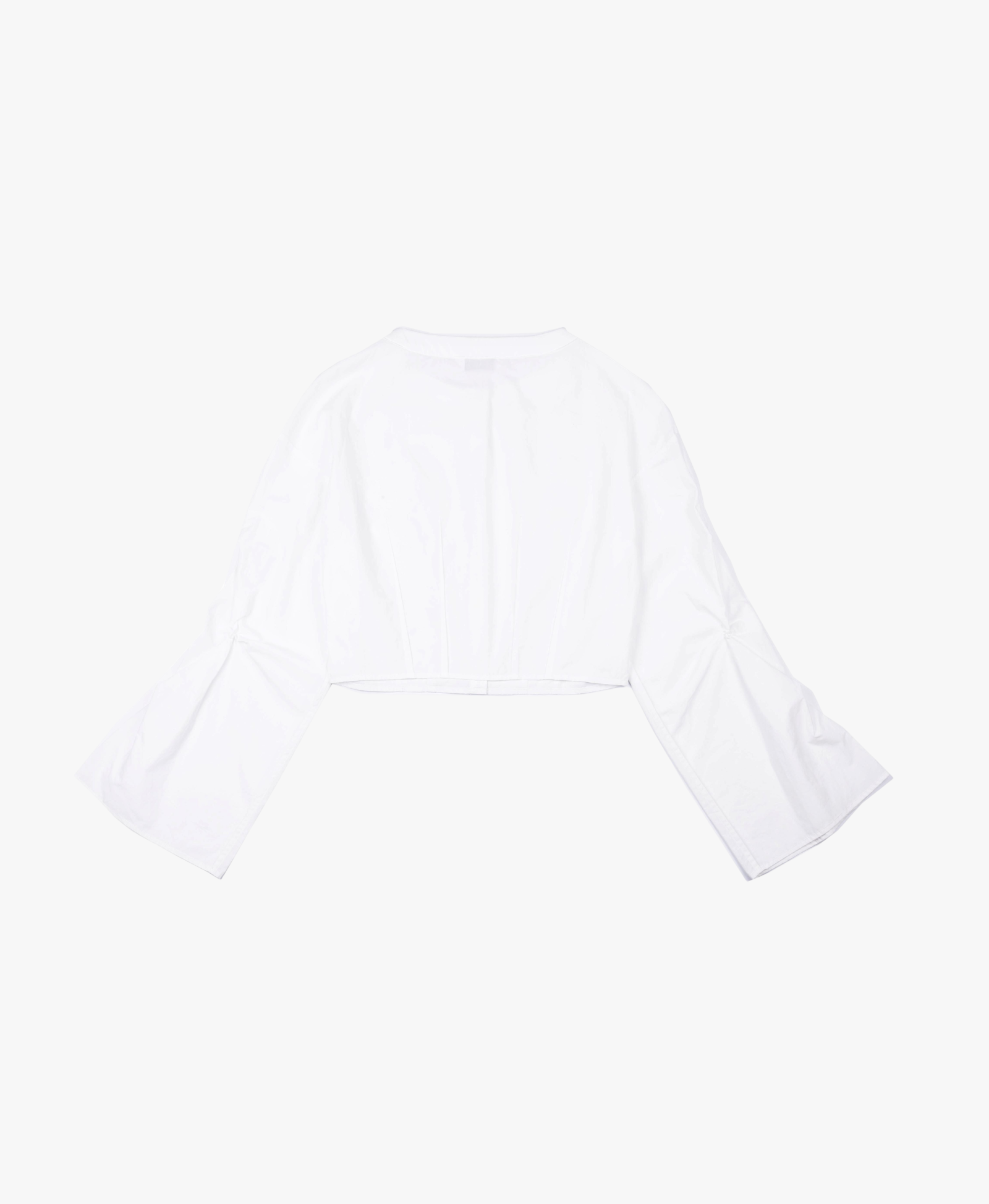 CROPPED WHITE BLOUSE WITH CROCHET FLOWER AND SMOCKED BELL SLEEVES made by YIBRI