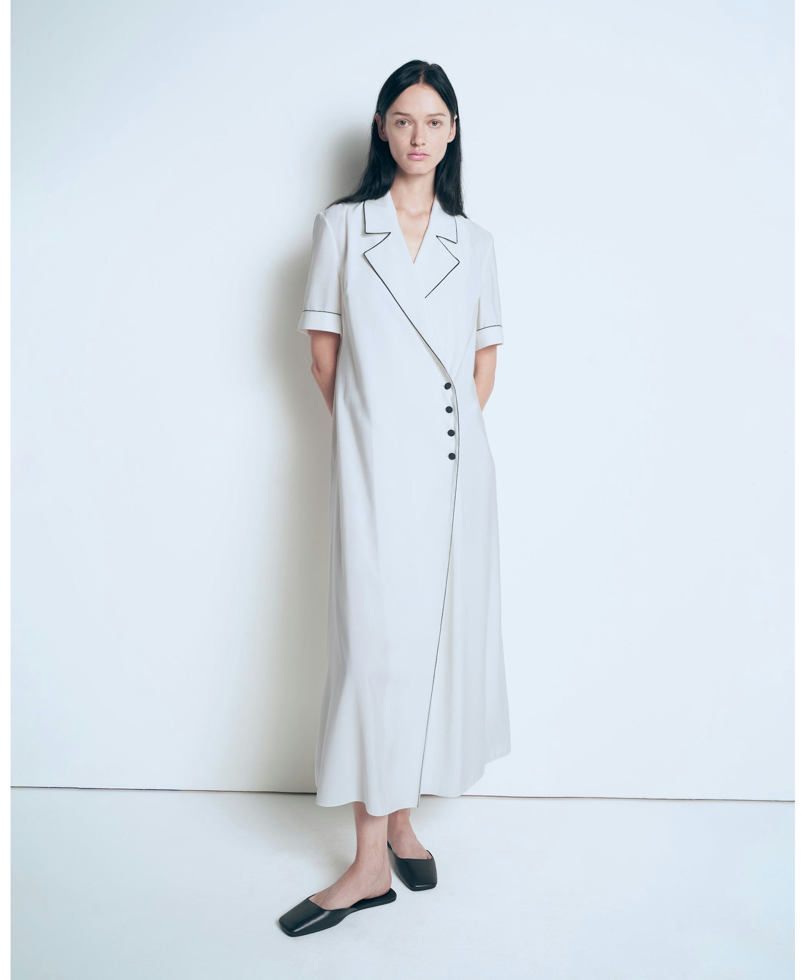 Dress with piping made by A.M.G