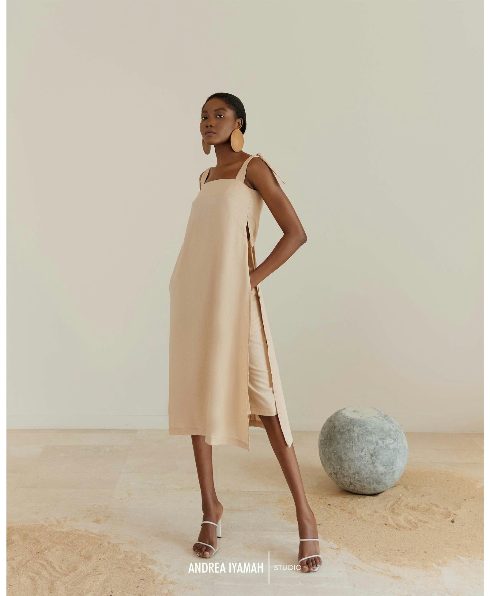 AFO CREAM MIDI SKIRT made by Andrea Iyamah