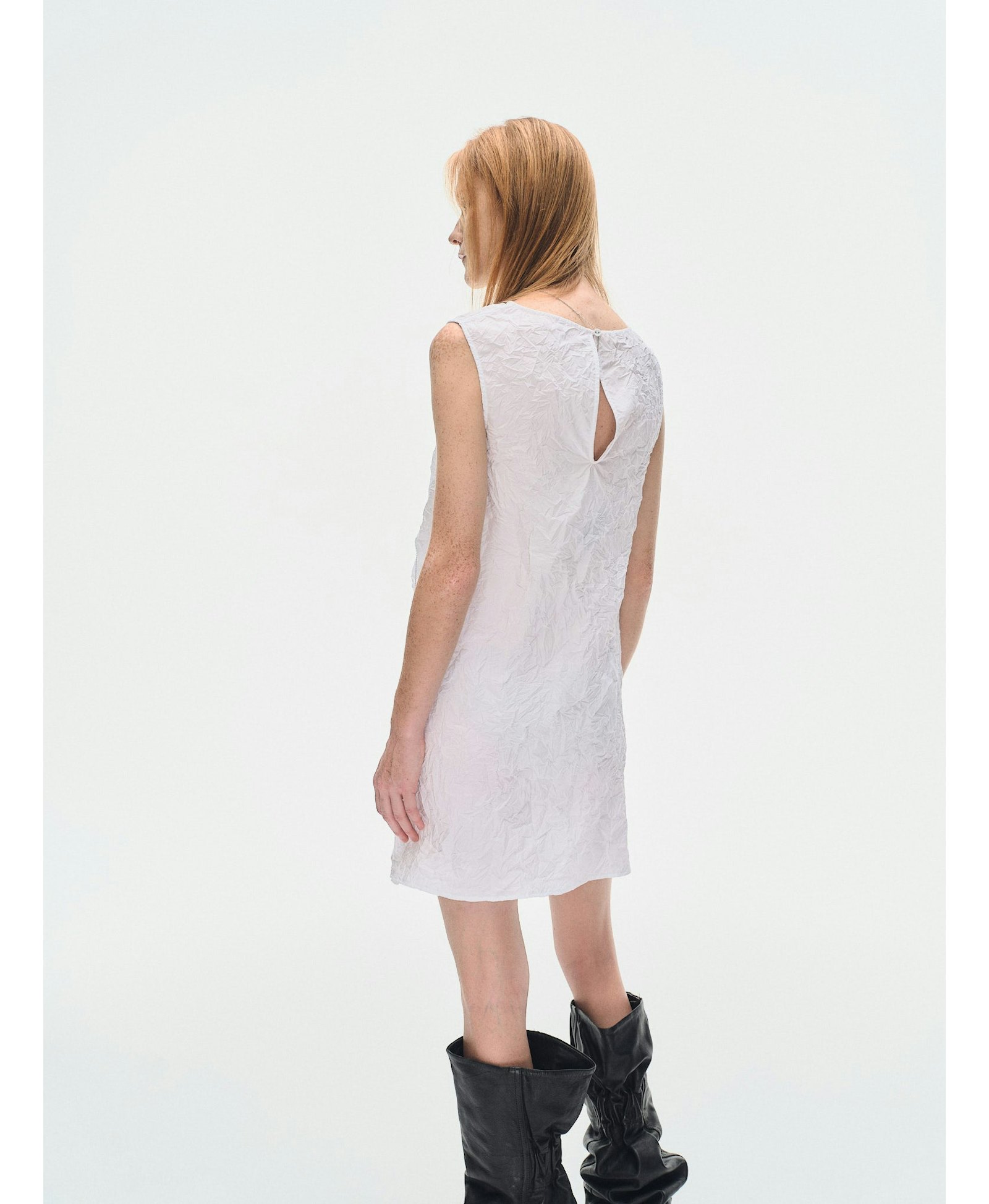 WHITE TEXTURED DRAPED MINI DRES made by YIBRI