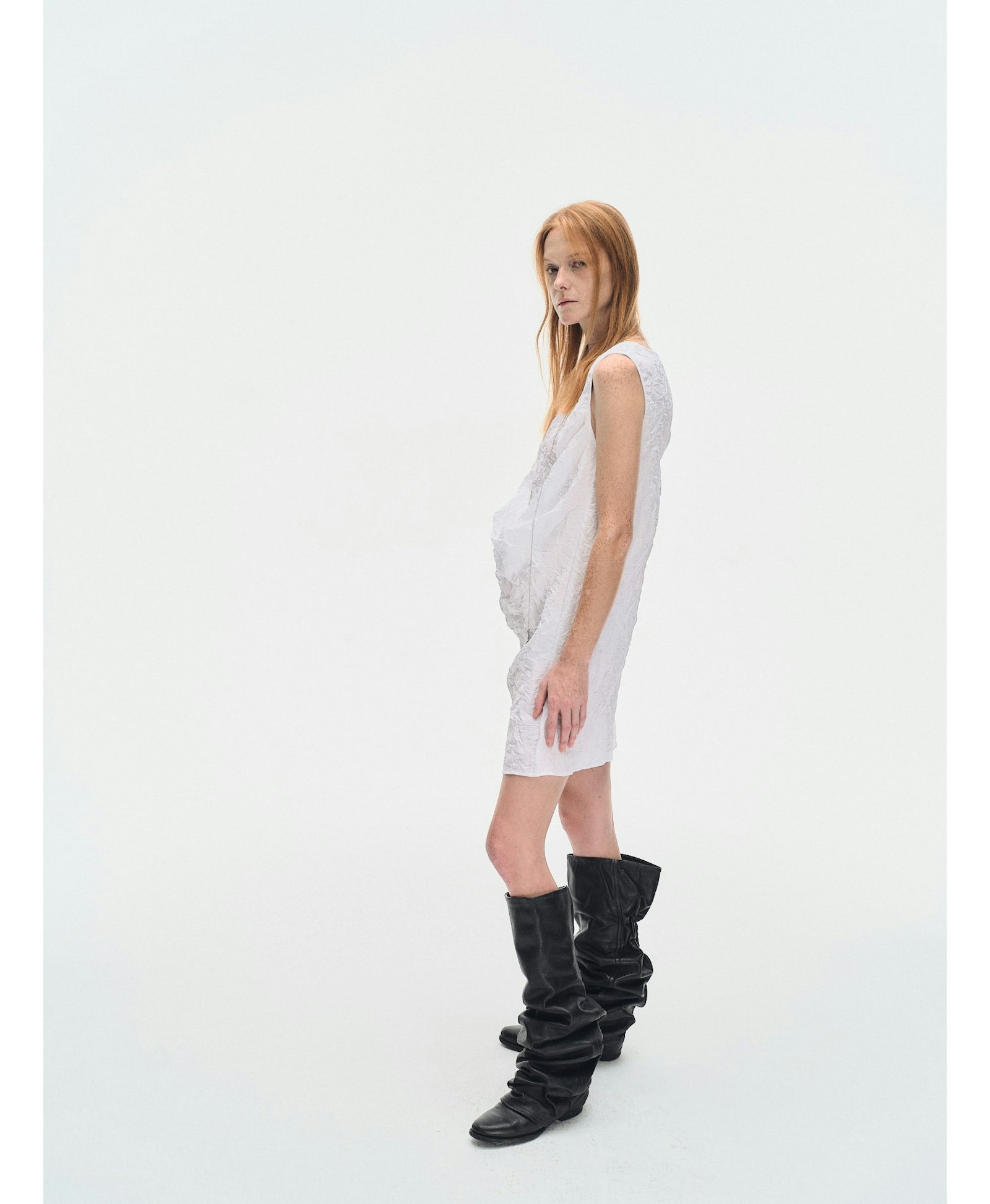 WHITE TEXTURED DRAPED MINI DRES made by YIBRI