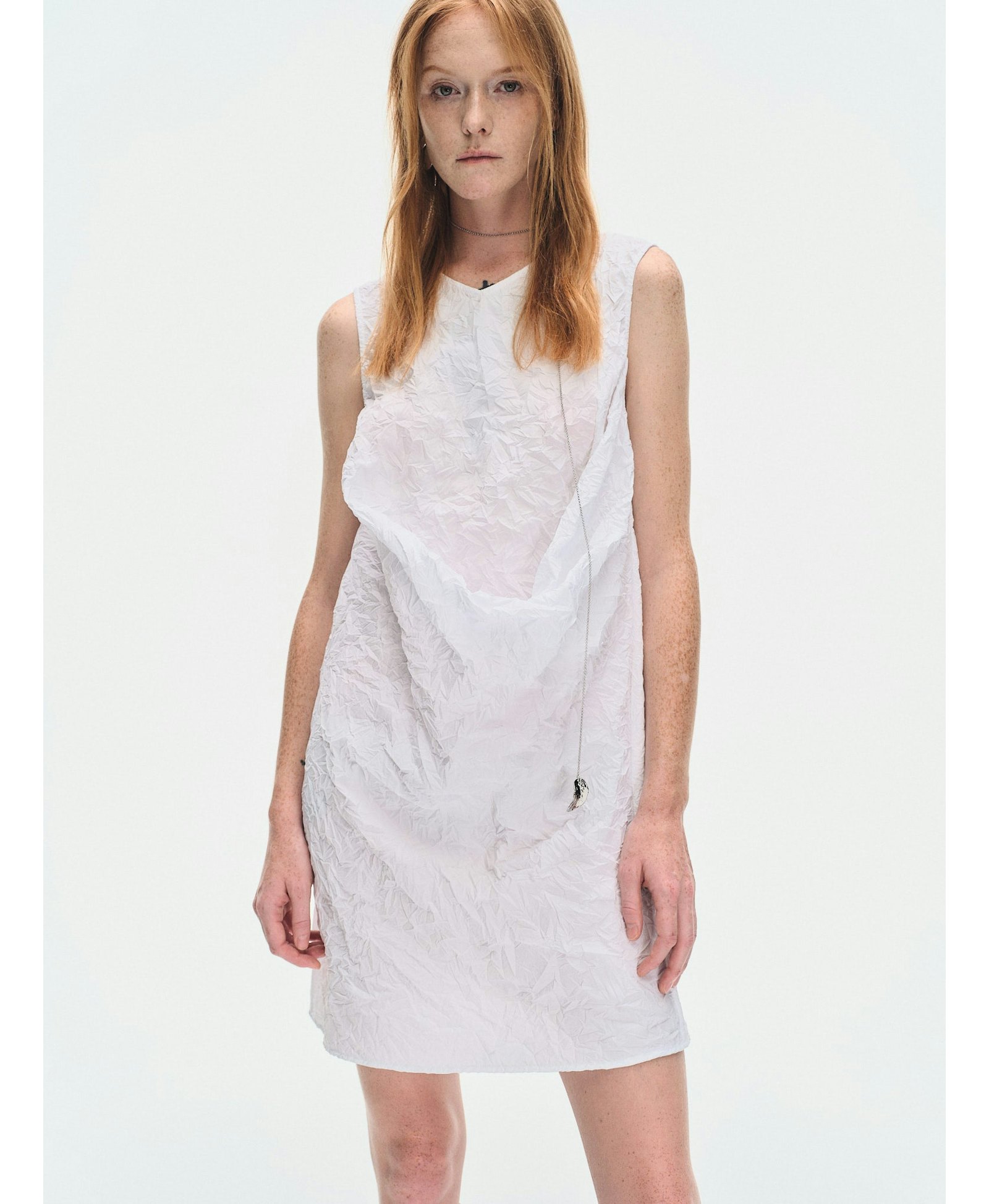WHITE TEXTURED DRAPED MINI DRES made by YIBRI