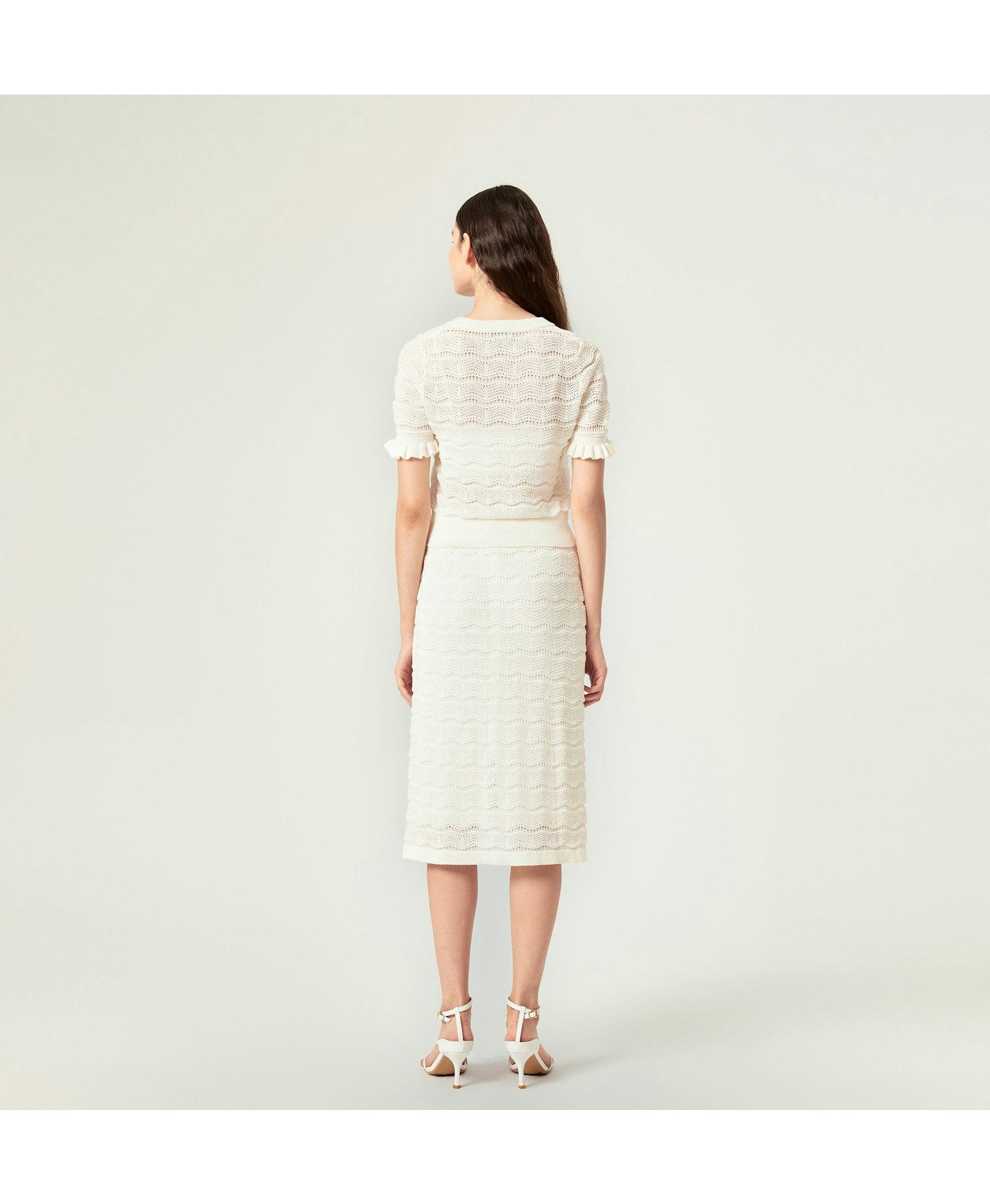 WAVY HOLLOW OUT TOP in White made by CRUSH Collection