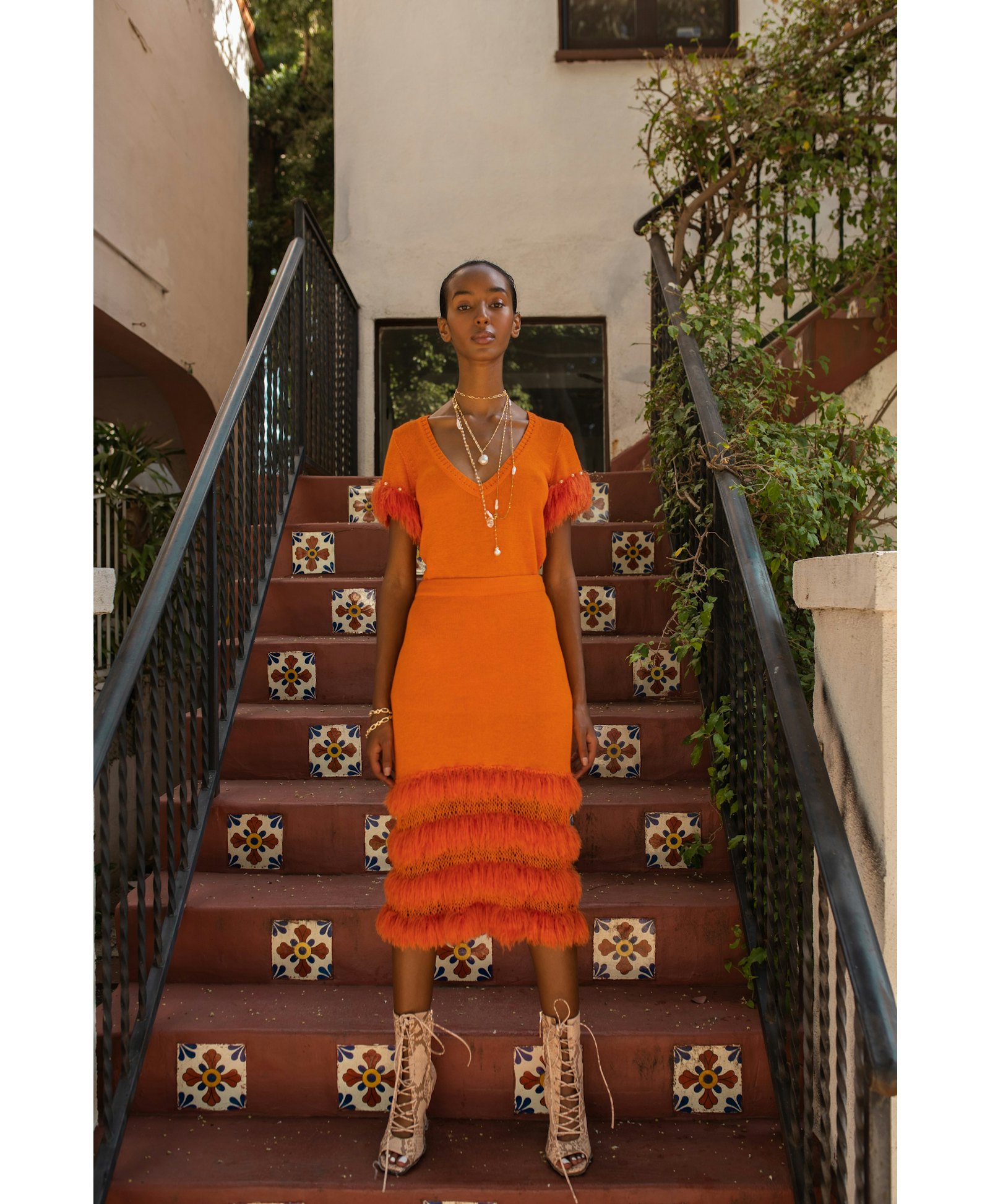 Golden poppy knit top with handmade knit details and pearls made by ANDREEVA