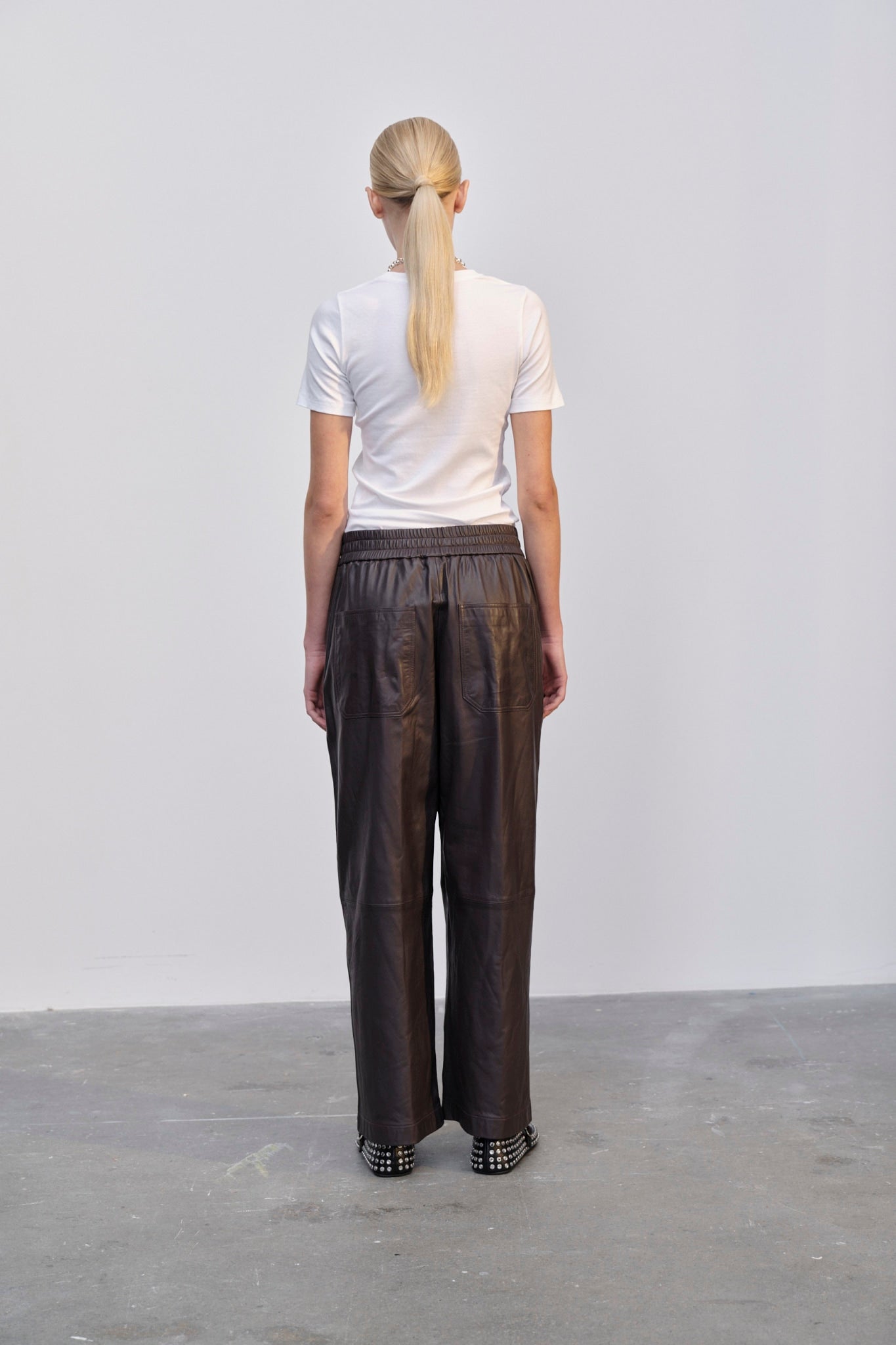 Shop Herskind Eagle Long Leather Pants In Brown