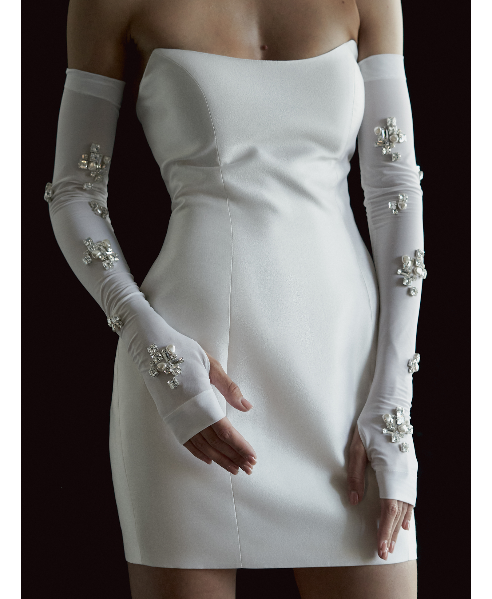 FINGERLESS GLOVES WITH JEWEL AND PEARL EMBELLISHMENTS in White made by NDS The Label