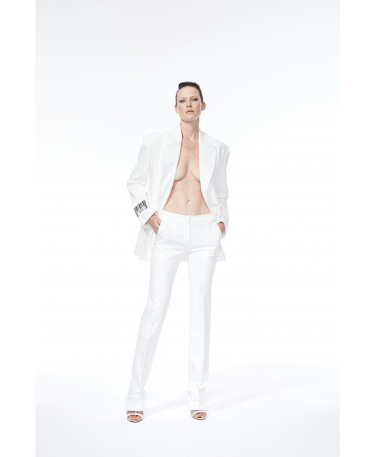 TAILORED SLIM TROUSERS made by NUÉ