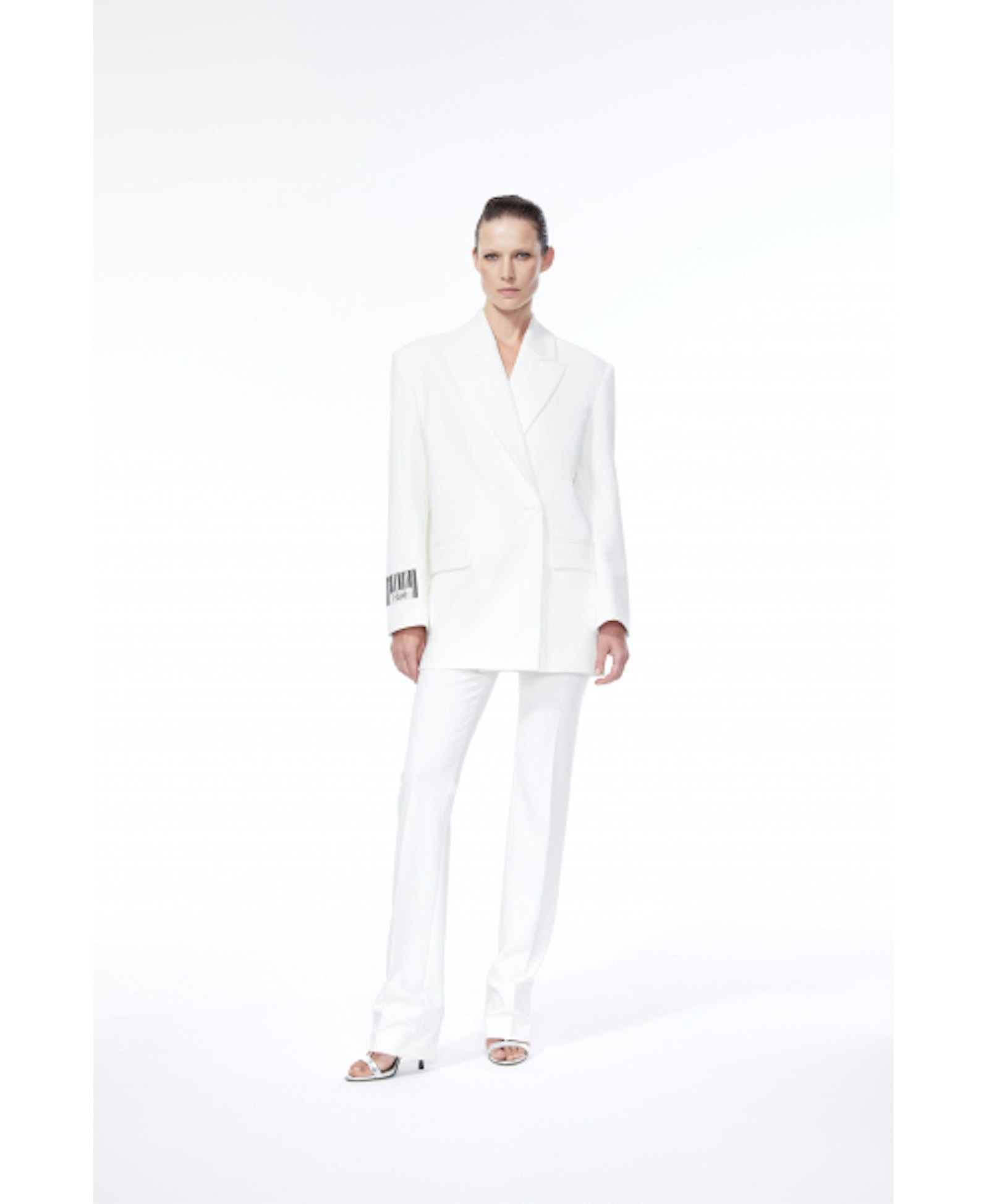 TAILORED SLIM TROUSERS made by NUÉ