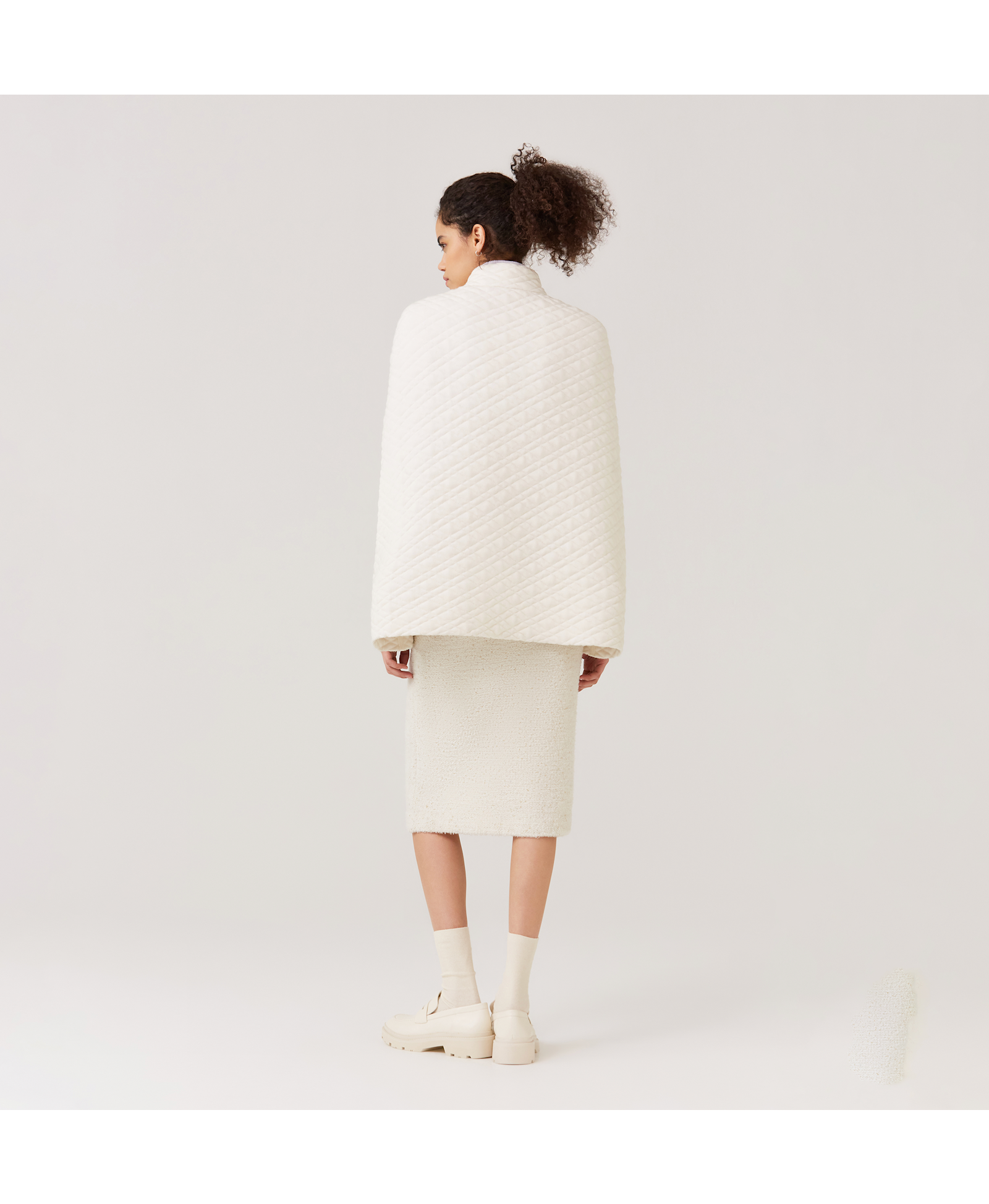 QUILTED-KNIT CAPE in White made by CRUSH Collection